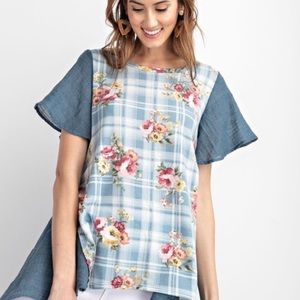 Well made hi lo print top. Loose and very soft.